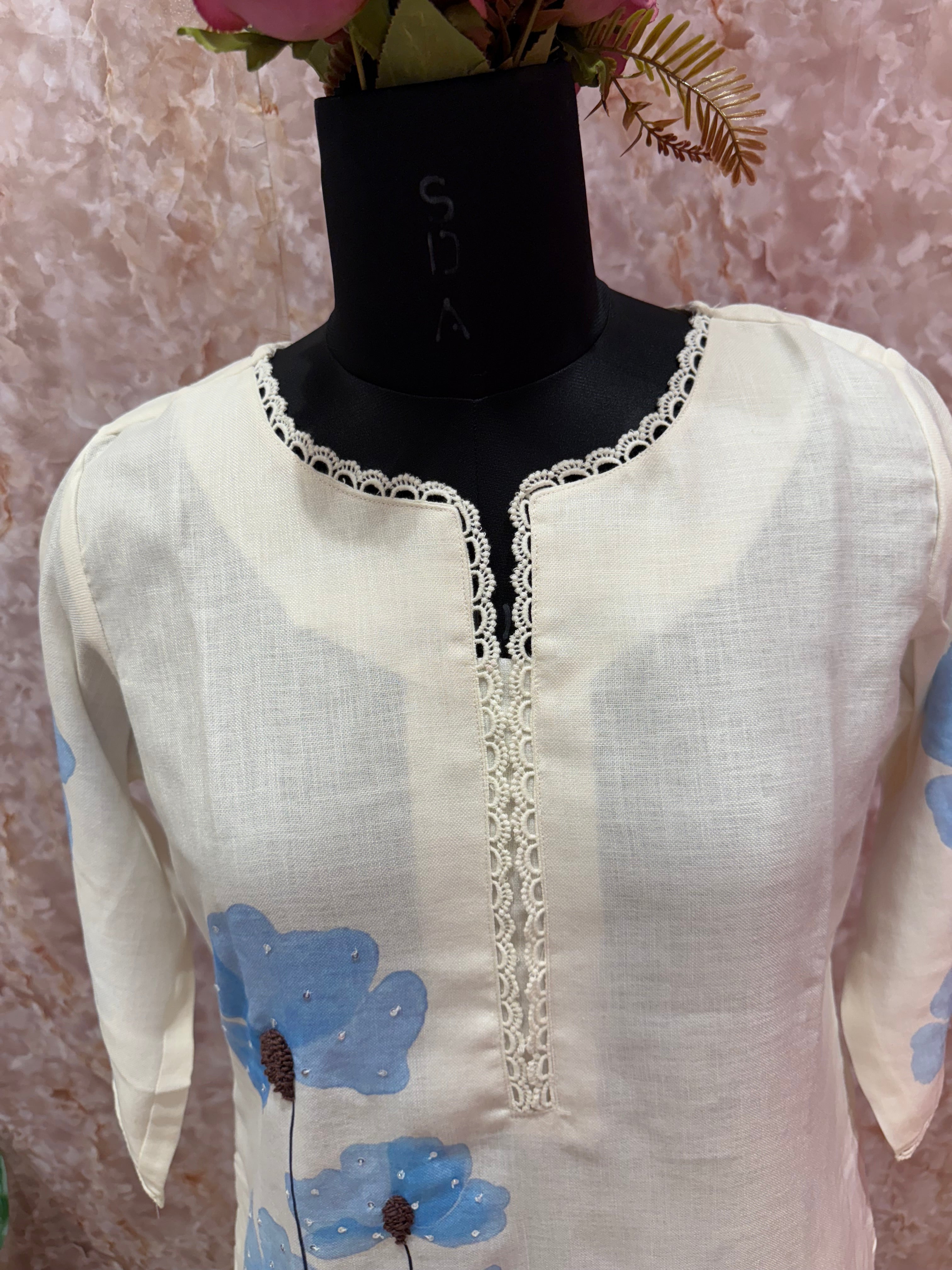 Elegant Off-White Floral Cotton Suit with Blue Accents