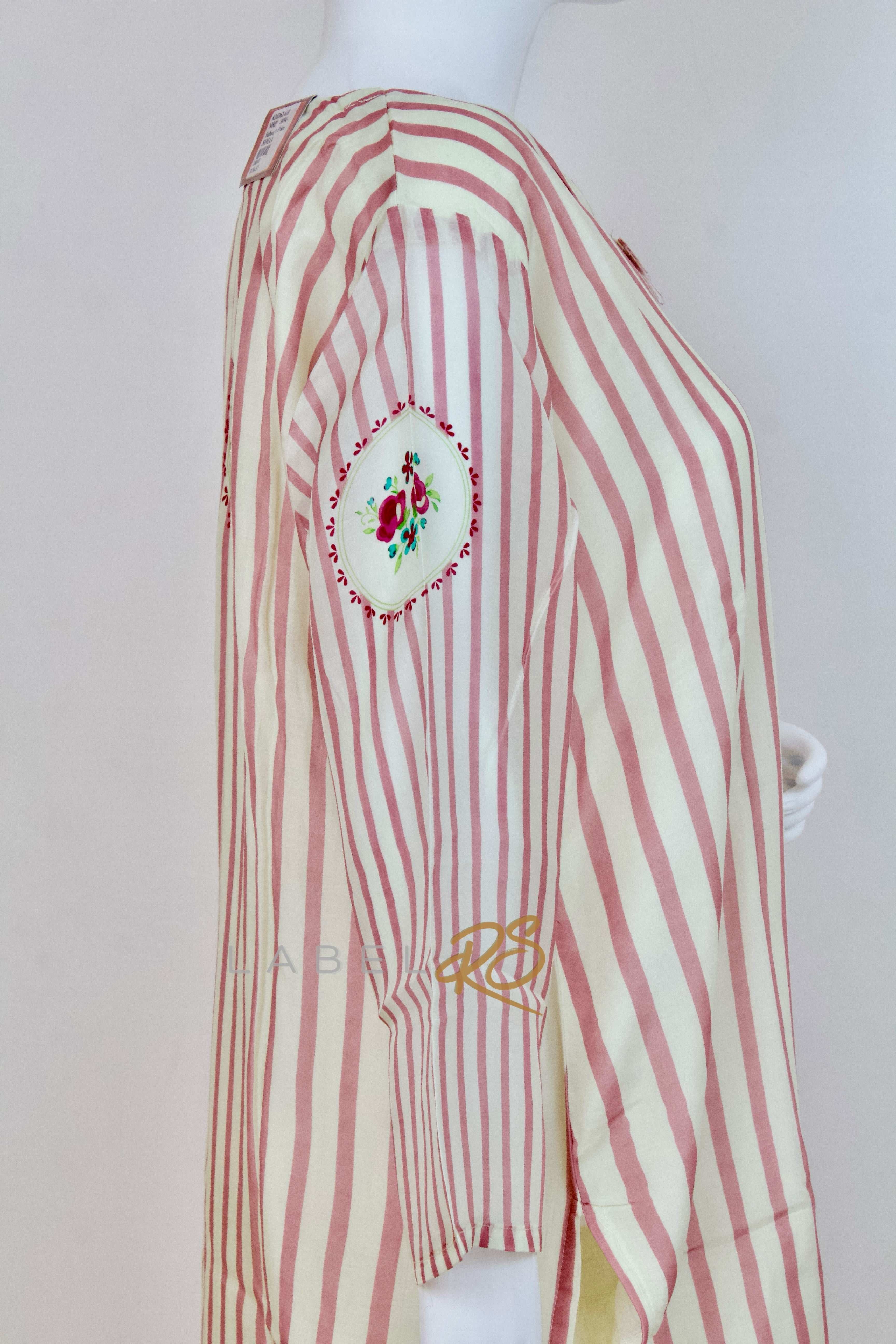 Striped Suit adorned with delicate tassels.