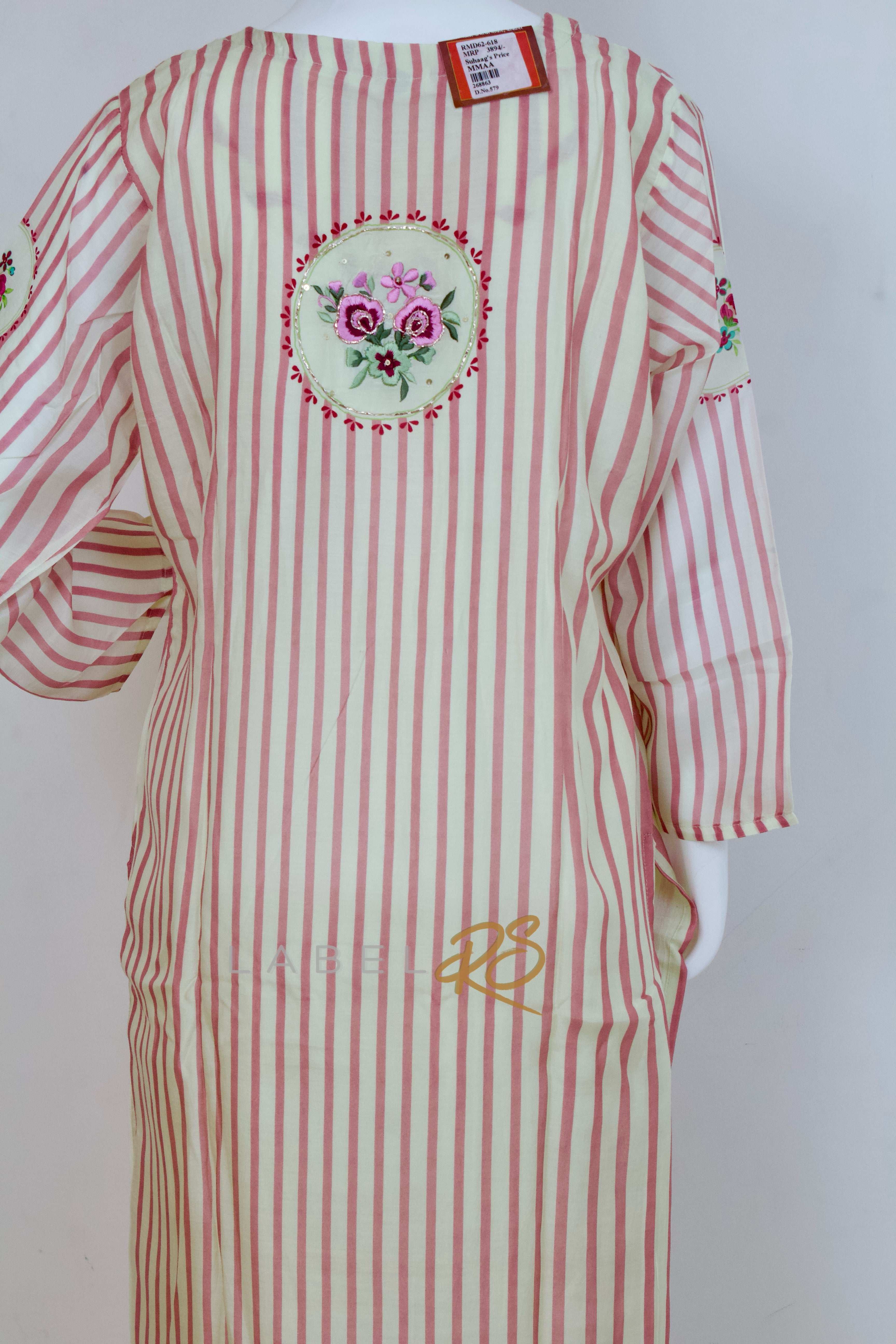 Striped Suit adorned with delicate tassels.